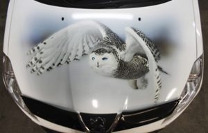 Винилография ввиде совы на капот Peugeot 4007