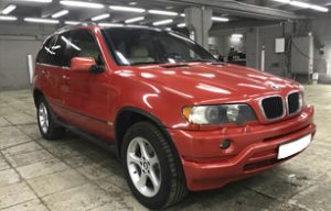 Полная оклейка BMW X5 в красный металлик 5