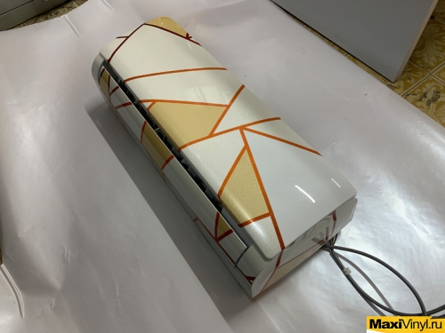 Оклейка кондиционера Haier винилографией